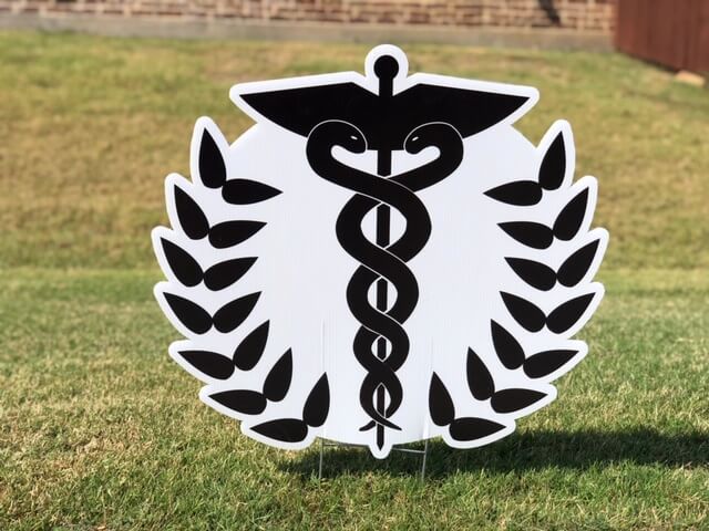 A caduceus symbol with olive branches on either side