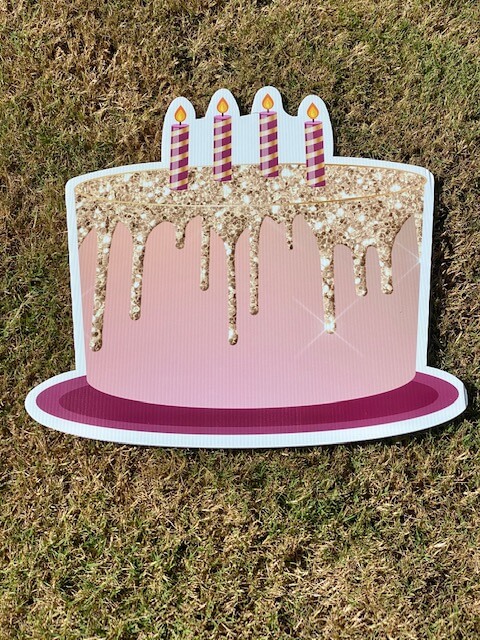 A pink birthday cake