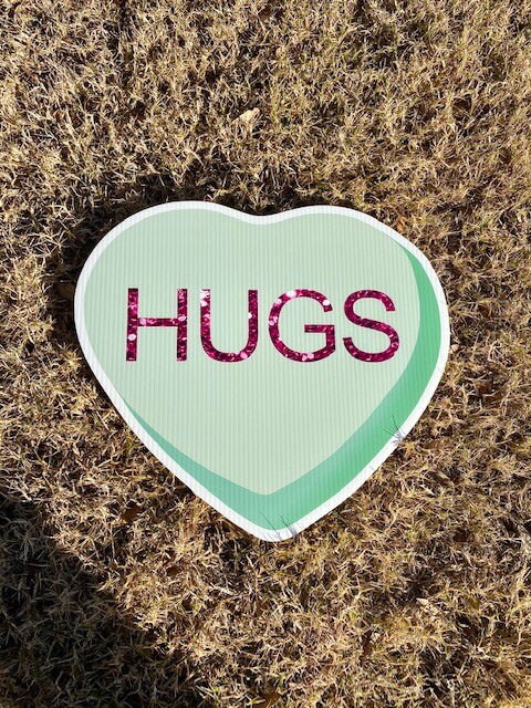 Green Candy Heart with the words Hugs