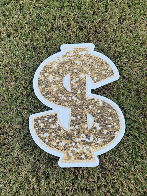 blingy gold dollar sign